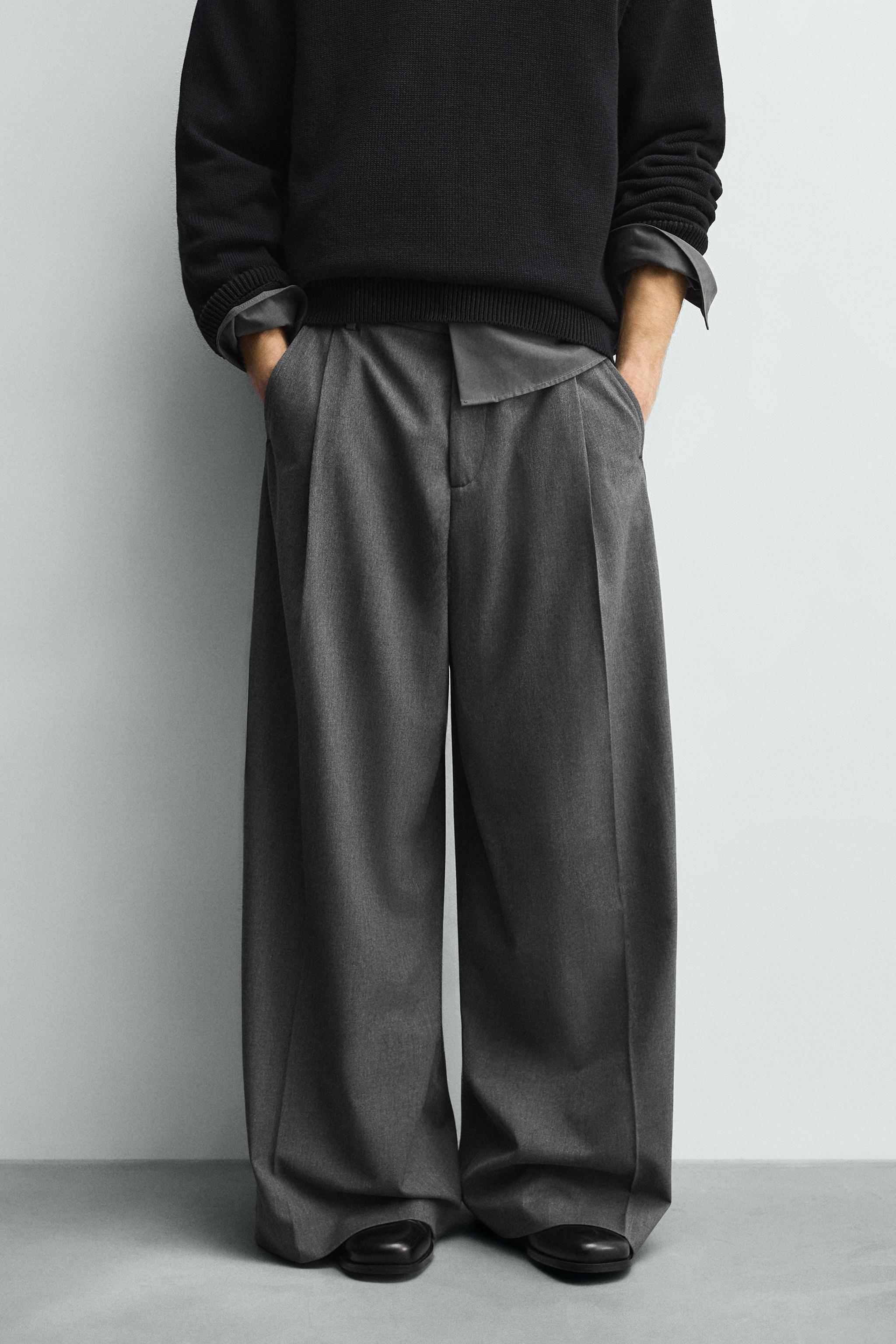 PLEATED WIDE FIT PANTS